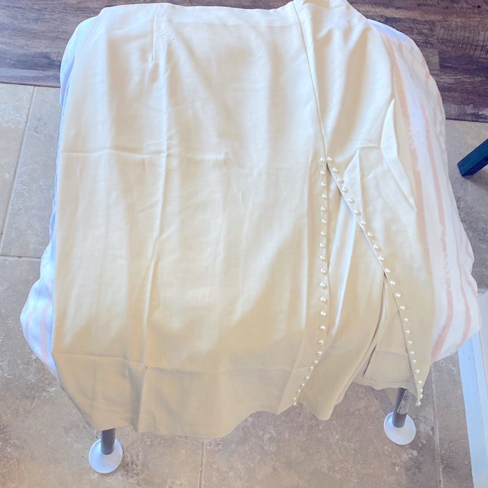Cream Dress Skirt with pearl detail.